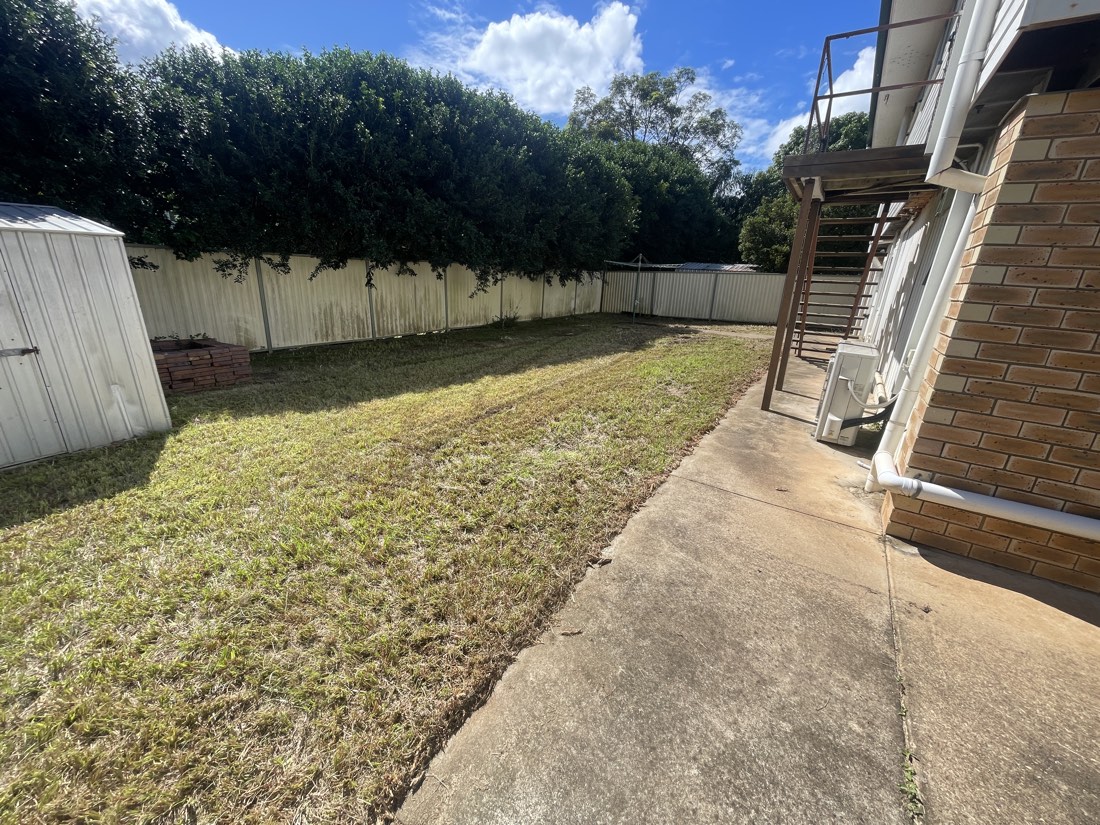 Neatly mowed backyard after service, Brisbane North