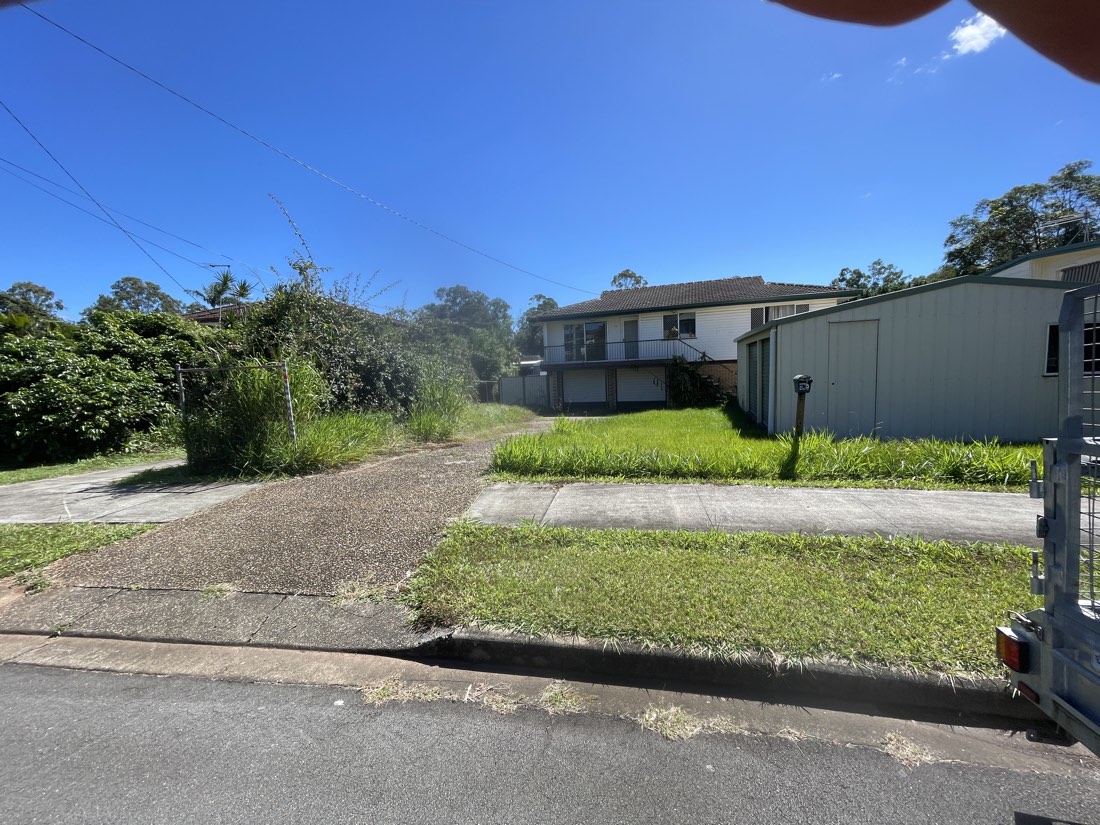 Overgrown front lawn before mowing, Brisbane North